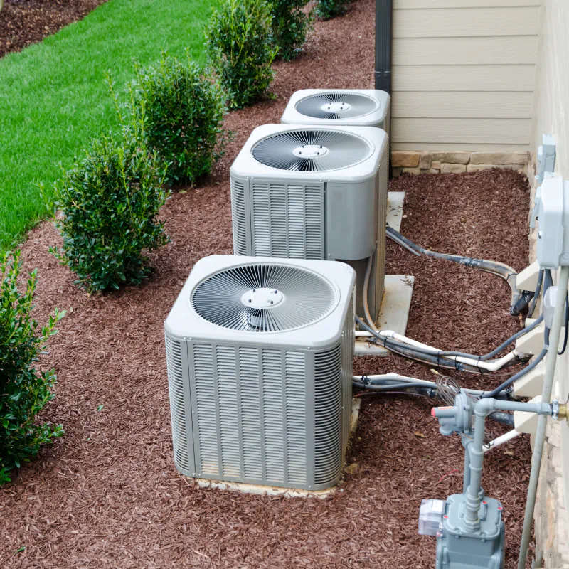 exterior hvac installed in backyard of residential house